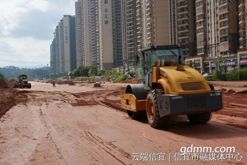 信宜站前大道建设已完成土方回填,已进入路面基层施工